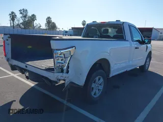 2023 Ford F-150 XL with VIN 1FTMF1C51PKD58283, listed as a IAAI auction lot 41752279 with 90,263 mi miles and . Bid and sale history available at carsss.com. Image 4.