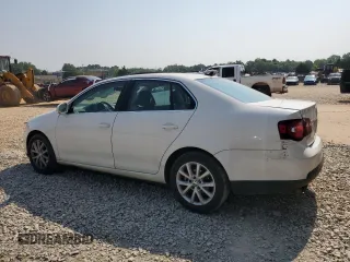 2010 Volkswagen Jetta SEL with VIN 3VWRX7AJ0AM047012, listed as a Copart auction lot 59076515 with 189,464 mi miles and Salvage title. Bid and sale history available at DreamBid. Image 2.