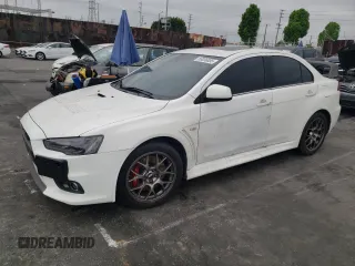 2014 Mitsubishi Lancer Evolution MR z VIN JA32W5FV9EU001587, wystawiony jako Copart lot #56056855 z przebiegiem 91 297 mil mil oraz Szkoda całkowita • Salvage title. Historia ofert i sprzedaży dostępna na DreamBid. Obrazek 1.