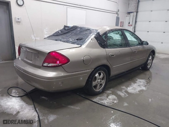 2005 Ford Taurus SE with VIN 1FAFP53U45A227863, listed as a IAAI auction lot 41222918 with 1 miles. Bid and sale history available at carsss.com. Image 4.