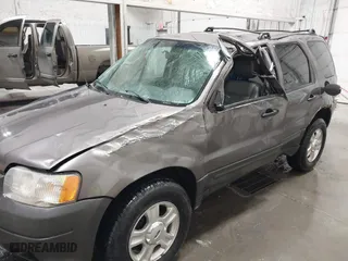 2004 Ford Escape XLT with VIN 1FMCU93174KB67570, listed as a IAAI auction lot 41228124 with 160,176 mi miles. Bid and sale history available at carsss.com. Image 6.