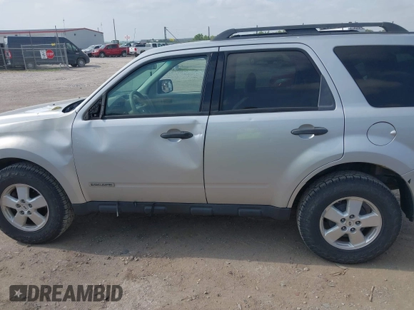 2008 Ford Escape XLT with VIN 1FMCU93188KD05798, listed as a IAAI auction lot 42497044 with 215,954 mi miles and . Bid and sale history available at DreamBid. Image 14.