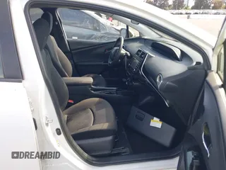 2021 Toyota Prius LE with VIN JTDKAMFP7M3197111, listed as a IAAI auction lot 42031569 with 240,098 mi miles and . Bid and sale history available at DreamBid. Image 5.