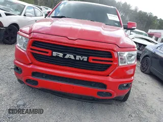 2020 Ram 1500 Big Horn z VIN 1C6SRFFT3LN301735, wystawiony jako IAAI lot #41954914 z przebiegiem 95 279 mil mil oraz . Historia ofert i sprzedaży dostępna na DreamBid. Obrazek 12.