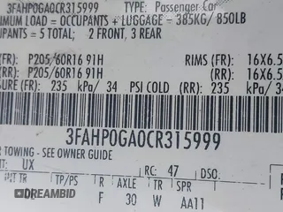 2012 Ford Fusion S with VIN 3FAHP0GA0CR315999, listed as a IAAI auction lot 40937858 with 164,719 mi miles. Bid and sale history available at carsss.com. Image 9.
