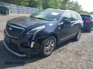 2021 Cadillac XT5 AWD Premium Luxury z VIN 1GYKNDRS8MZ217572, wystawiony jako IAAI lot #42190571 z przebiegiem 25 100 mil mil oraz . Historia ofert i sprzedaży dostępna na DreamBid. Obrazek 17.