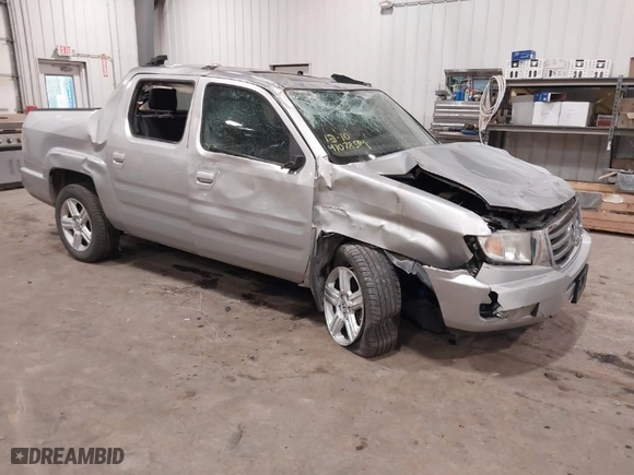 2014 Honda Ridgeline RTL with VIN 5FPYK1F57EB012362, listed as a IAAI auction lot 41078509 with 149,590 mi miles. Bid and sale history available at carsss.com. Image 1.
