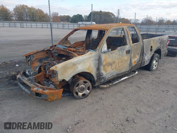 2005 Ford F-150 STX with VIN 1FTRX12W55NA60523, listed as a IAAI auction lot 41106389 with 1 mi miles. Bid and sale history available at carsss.com. Image 2.