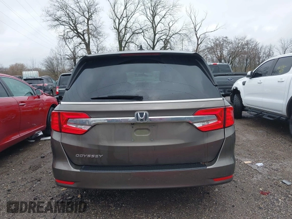 2018 Honda Odyssey EX-L with VIN 5FNRL6H72JB081086, listed as a IAAI auction lot 41031370 with 73,907 mi miles and . Bid and sale history available at DreamBid. Image 16.