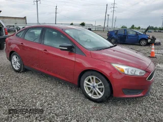 2015 Ford Focus SE with VIN 1FADP3F2XFL384485, listed as a Copart auction lot 60316375 with 110,321 mi miles and Clean title. Bid and sale history available at DreamBid. Image 4.