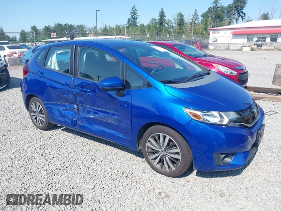 2015 Honda Fit EX-L z VIN 3HGGK5H83FM732503, wystawiony jako IAAI lot #42397823 z przebiegiem 87 522 mil mil oraz . Historia ofert i sprzedaży dostępna na DreamBid. Obrazek 1.