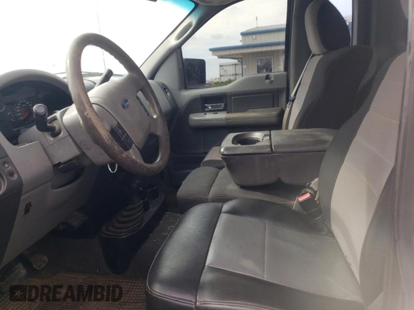 2007 Ford F-150 XL with VIN 1FTRF14V97KB65061, listed as a Copart auction lot 56280705 with 310,029 mi miles and Salvage title. Bid and sale history available at DreamBid. Image 10.