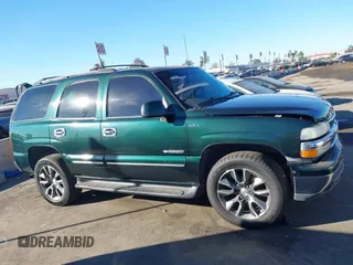 2002 Chevrolet Tahoe LS with VIN 1GNEC13T12R134174, listed as a IAAI auction lot 41233999 with 235,892 mi miles. Bid and sale history available at carsss.com. Image 13.