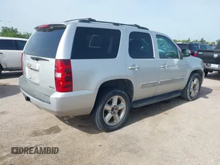 2011 Chevrolet Tahoe LS with VIN 1GNSCAE0XBR111949, listed as a IAAI auction lot 42630787 with 220,857 mi miles and . Bid and sale history available at DreamBid. Image 4.