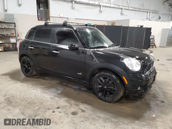 2013 MINI Countryman S ALL4 with VIN WMWZC5C55DWM15639, listed as a Copart auction lot 50991075 with 120,098 mi miles and Salvage Title. Bid and sale history available at DreamBid. Image 4.