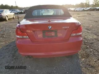 2010 BMW 1 Series 128i with VIN WBAUL7C54AVJ77712, listed as a Copart auction lot 83158294 with Not provided miles and Salvage title. Bid and sale history available at DreamBid. Image 6.