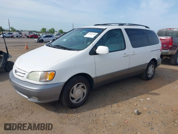2002 Toyota Sienna LE with VIN 4T3ZF13CX2U506371, listed as a IAAI auction lot 42058440 with 215,434 mi miles. Bid and sale history available at carsss.com. Image 2.