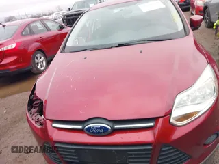 2013 Ford Focus SE z VIN 1FADP3F27DL324354, wystawiony jako IAAI lot #41909025 z przebiegiem 99 096 mil mil oraz . Historia ofert i sprzedaży dostępna na DreamBid. Obrazek 13.