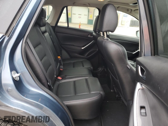 2016 Mazda CX-5 Grand Touring with VIN JM3KE2DY0G0748190, listed as a Copart auction lot 51913155 with 107,997 mi miles and Salvage Title. Bid and sale history available at carsss.com. Image 10.