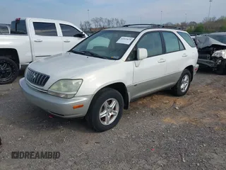 2003 Lexus RX 300 z VIN JTJGF10U730154745, wystawiony jako IAAI lot #41915670 z przebiegiem 174 314 mil mil oraz . Historia ofert i sprzedaży dostępna na DreamBid. Obrazek 2.
