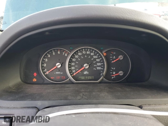 2002 Kia Sedona LX with VIN KNDUP131426217512, listed as a Copart auction lot 80928774 with 163,176 mi miles and Salvage Title. Bid and sale history available at carsss.com. Image 9.