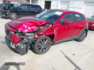 2018 Mazda CX-3 Touring with VIN JM1DKDC7XJ0318219, listed as a IAAI auction lot 41941104 with 86,186 mi miles. Bid and sale history available at carsss.com. Image 2.