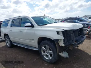 2015 Chevrolet Suburban LTZ with VIN 1GNSKKKC5FR127201, listed as a IAAI auction lot 41706562 with 151,644 mi miles and . Bid and sale history available at DreamBid. Image 14.