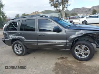 2004 Jeep Grand Cherokee Limited with VIN 1J8GX58N34C360819, listed as a IAAI auction lot 41816348 with 144,609 mi miles and . Bid and sale history available at DreamBid. Image 13.