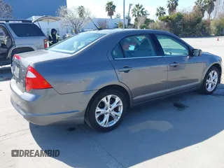 2012 Ford Fusion SE z VIN 3FAHP0HA8CR401382, wystawiony jako IAAI lot #41739680 z przebiegiem 73 404 mil mil oraz . Historia ofert i sprzedaży dostępna na DreamBid. Obrazek 4.