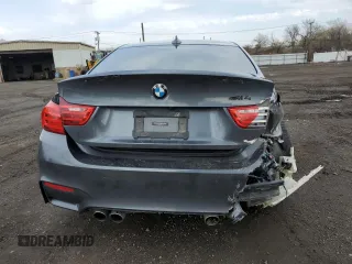 2015 BMW M4 z VIN WBS3R9C57FK329427, wystawiony jako Copart lot #53252995 z przebiegiem 94 039 mil mil oraz Szkody całkowita. Historia ofert i sprzedaży dostępna na DreamBid. Obrazek 6.