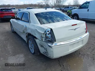 2008 Chrysler 300 C Hemi with VIN 2C3KA63H18H335807, listed as a IAAI auction lot 41986105 with 149,837 mi miles and . Bid and sale history available at carsss.com. Image 3.