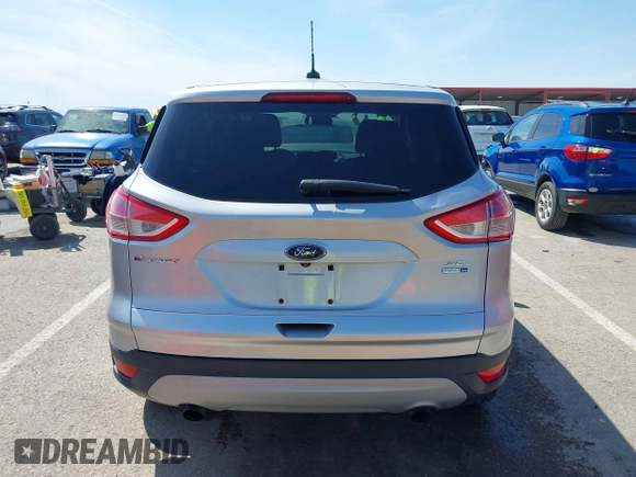 2016 Ford Escape SE with VIN 1FMCU9G98GUA10333, listed as a IAAI auction lot 42021490 with 128,973 mi miles. Bid and sale history available at carsss.com. Image 17.