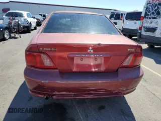 2002 Mitsubishi Galant ES z VIN 4A3AA46G12E090145, wystawiony jako Copart lot #68953104 z przebiegiem 135 395 mil mil oraz Szkody całkowita. Historia ofert i sprzedaży dostępna na DreamBid. Obrazek 6.