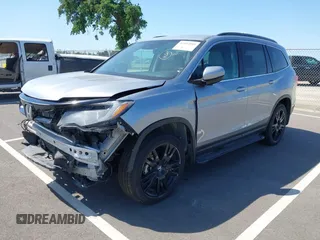 2021 Honda Pilot Special Edition with VIN 5FNYF6H27MB094704, listed as a IAAI auction lot 41953899 with 55,462 mi miles and . Bid and sale history available at DreamBid. Image 2.