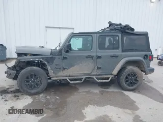 2023 Jeep Wrangler Willys with VIN 1C4HJXDN1PW596046, listed as a IAAI auction lot 41580875 with 48,451 mi miles and . Bid and sale history available at DreamBid. Image 15.