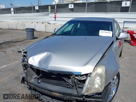 2008 Cadillac CTS RWD with VIN 1G6DM577280111413, listed as a IAAI auction lot 42238643 with 114,706 mi miles and . Bid and sale history available at DreamBid. Image 6.