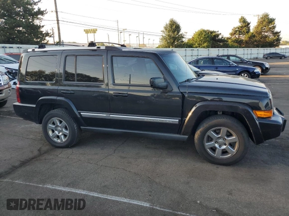2008 Jeep Commander Limited with VIN 1J8HH58N98C236772, listed as a Copart auction lot 71042404 with 217,780 mi miles and Salvage title. Bid and sale history available at DreamBid. Image 4.
