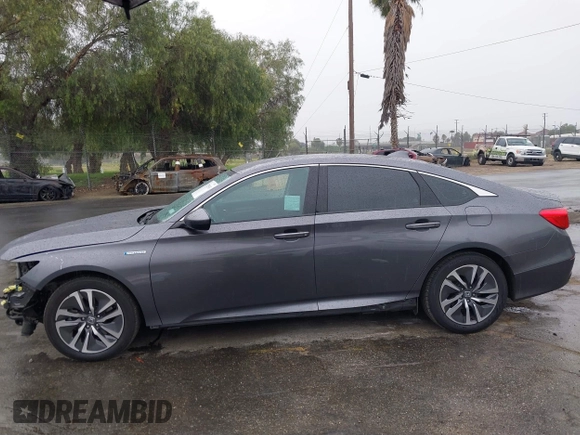 2020 Honda Accord with VIN 1HGCV3F13LA015933, listed as a IAAI auction lot 41720543 with 64,943 mi miles and . Bid and sale history available at DreamBid. Image 15.