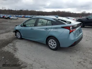 2021 Toyota Prius L Eco with VIN JTDKAMFU0M3134583, listed as a Copart auction lot 52434195 with 26,018 mi miles and Salvage Title. Bid and sale history available at carsss.com. Image 2.