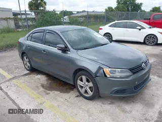 2013 Volkswagen Jetta TDI w/Premium with VIN 3VWLL7AJ4DM351806, listed as a IAAI auction lot 42654515 with 146,910 mi miles and . Bid and sale history available at DreamBid. Image 1.
