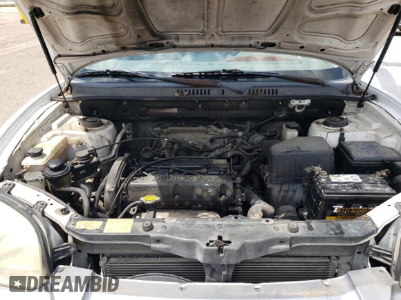 2004 Hyundai Santa Fe z VIN KM8SB12B04U640985, wystawiony jako Copart lot #56584595 z przebiegiem 239 527 mil mil oraz Szkoda całkowita • Salvage title. Historia ofert i sprzedaży dostępna na DreamBid. Obrazek 11.