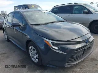 2023 Toyota Corolla Hybrid LE with VIN JTDBCMFE8P3023738, listed as a IAAI auction lot 41765597 with 59,938 mi miles. Bid and sale history available at carsss.com. Image 1.