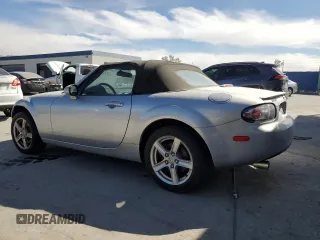 2007 Mazda MX-5 Miata Sport with VIN JM1NC25F470128936, listed as a Copart auction lot 45424585 with 123,910 mi miles and Salvage title. Bid and sale history available at DreamBid. Image 2.