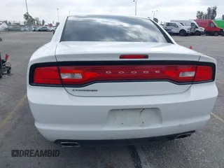 2014 Dodge Charger SE with VIN 2C3CDXBG3EH131242, listed as a IAAI auction lot 42121260 with 231,452 mi miles and . Bid and sale history available at DreamBid. Image 16.