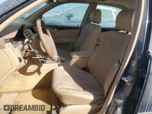 2000 Mercedes-Benz E-Class with VIN WDBJF65J7YB047628, listed as a Copart auction lot 75278704 with 0 mi miles and Salvage Title. Bid and sale history available at carsss.com. Image 7.