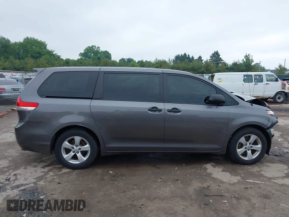 2014 Toyota Sienna L with VIN 5TDZK3DC5ES439593, listed as a IAAI auction lot 42420219 with 136,544 mi miles and . Bid and sale history available at DreamBid. Image 14.