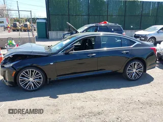 2024 Cadillac CT5 Premium Luxury with VIN 1G6DT5RK2R0131439, listed as a IAAI auction lot 42129787 with 1,801 mi miles and . Bid and sale history available at DreamBid. Image 14.