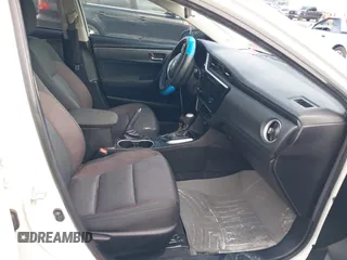 2019 Toyota Corolla L with VIN 5YFBURHE7KP908794, listed as a IAAI auction lot 38524964 with 65,069 mi miles. Bid and sale history available at carsss.com. Image 5.