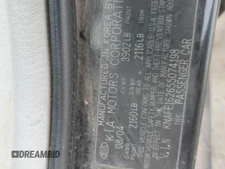 2005 Kia Spectra with VIN KNAFE162655074198, listed as a Copart auction lot 71015104 with 200,819 mi miles and Salvage Title. Bid and sale history available at DreamBid. Image 13.