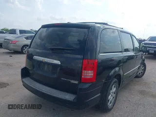 2010 Chrysler Town & Country Touring with VIN 2A4RR5D13AR155611, listed as a IAAI auction lot 42094894 with 132,966 mi miles. Bid and sale history available at carsss.com. Image 4.